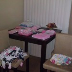 folding baby clothes