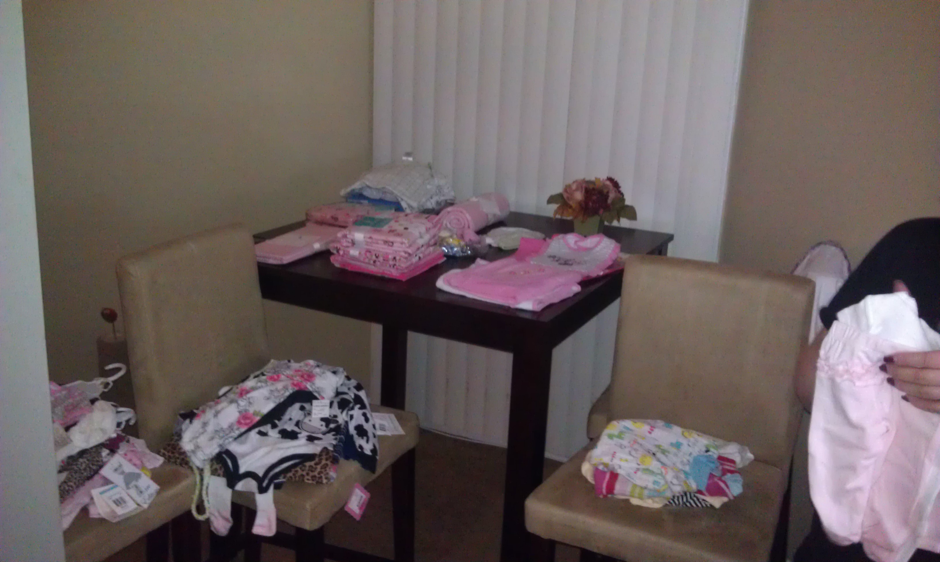folding baby clothes