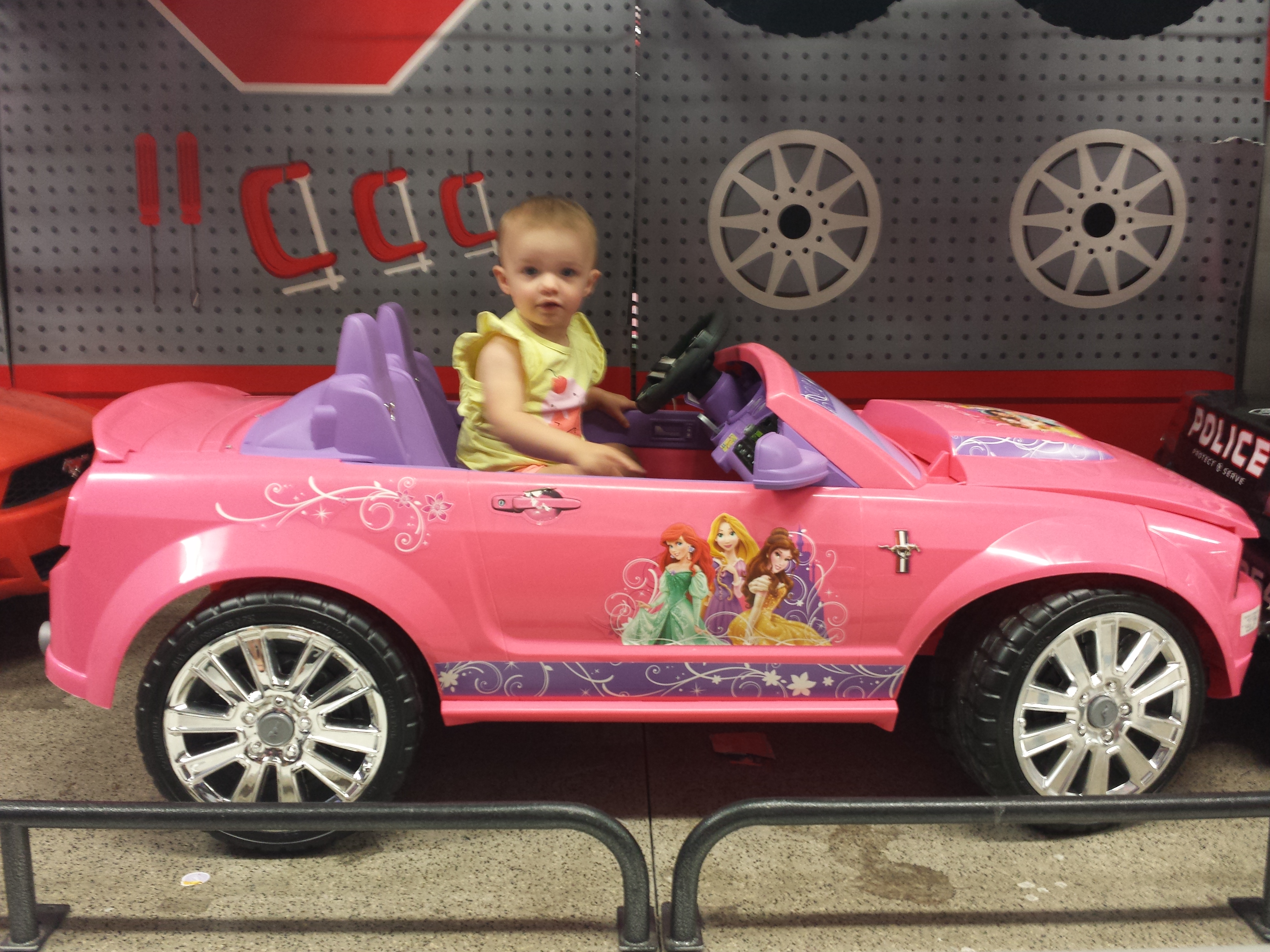 Arianna in pink sports car