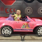 Arianna in pink sports car