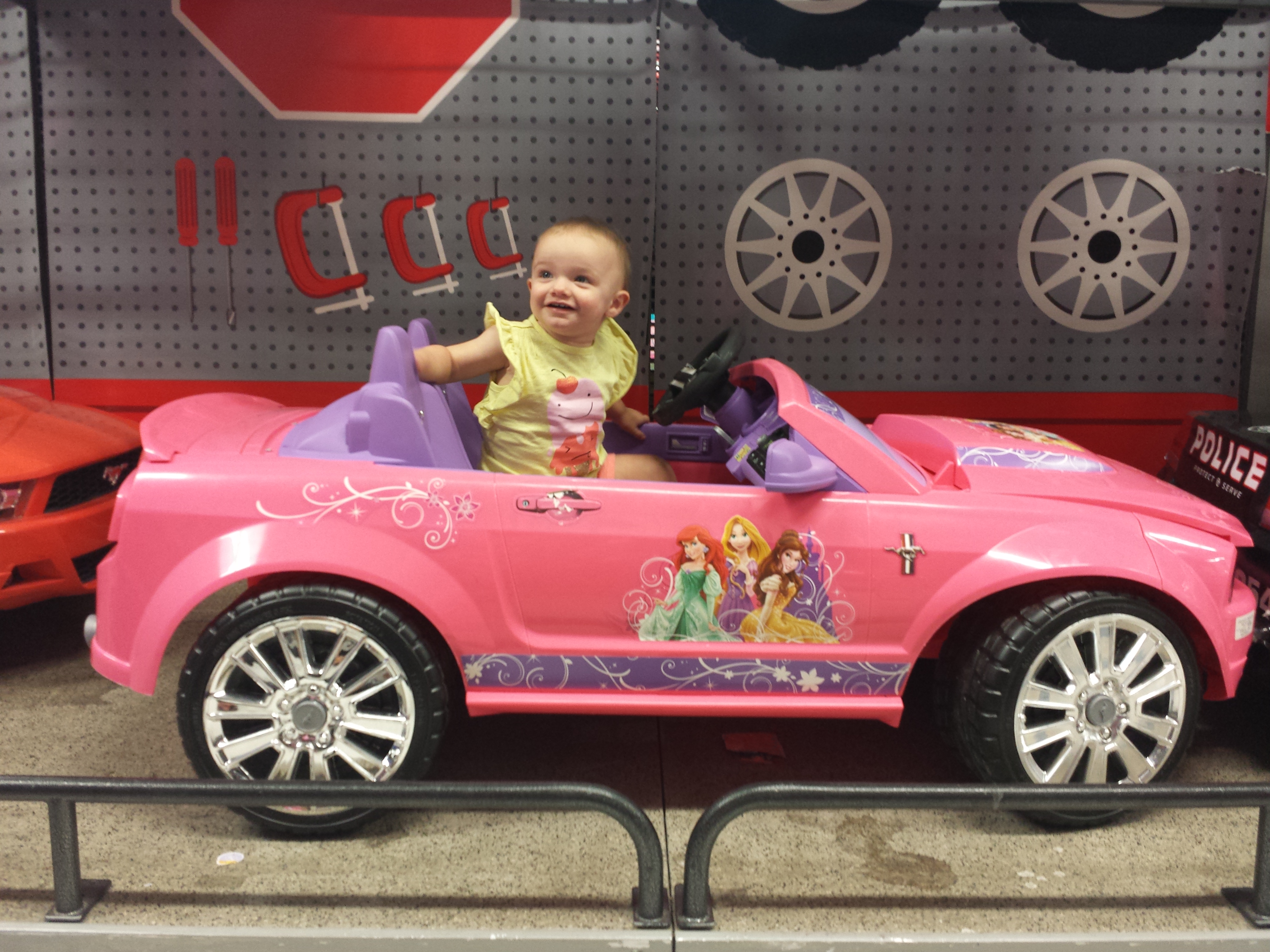 Arianna in pink sports car