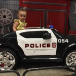 Arianna in police car