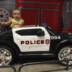Arianna in police car