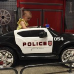 Arianna in police car