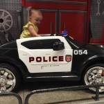 Arianna in police car