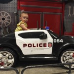 Arianna in police car