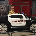 Arianna in police car